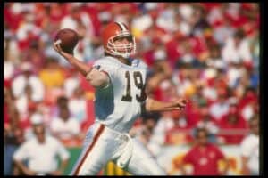 Quarterback Bernie Kosar of the Cleveland Browns passes the ball during a game against the Kansas City Chiefs at Cleveland Stadium in Cleveland, Ohio. The Chiefs won the game, 34-0.
