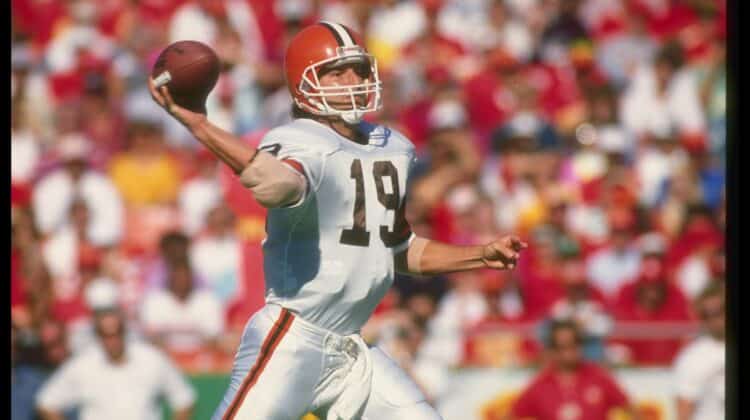 Quarterback Bernie Kosar of the Cleveland Browns passes the ball during a game against the Kansas City Chiefs at Cleveland Stadium in Cleveland, Ohio. The Chiefs won the game, 34-0.