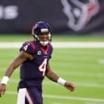 Deshaun Watson #4 of the Houston Texans reacts to a touchdown during the second half of a game against the Tennessee Titans at NRG Stadium on January 03, 2021 in Houston, Texas.