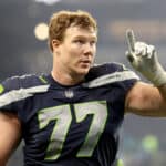 Ethan Pocic #77 of the Seattle Seahawks reacts after defeating the Detroit Lions 51-29 at Lumen Field on January 02, 2022 in Seattle, Washington.