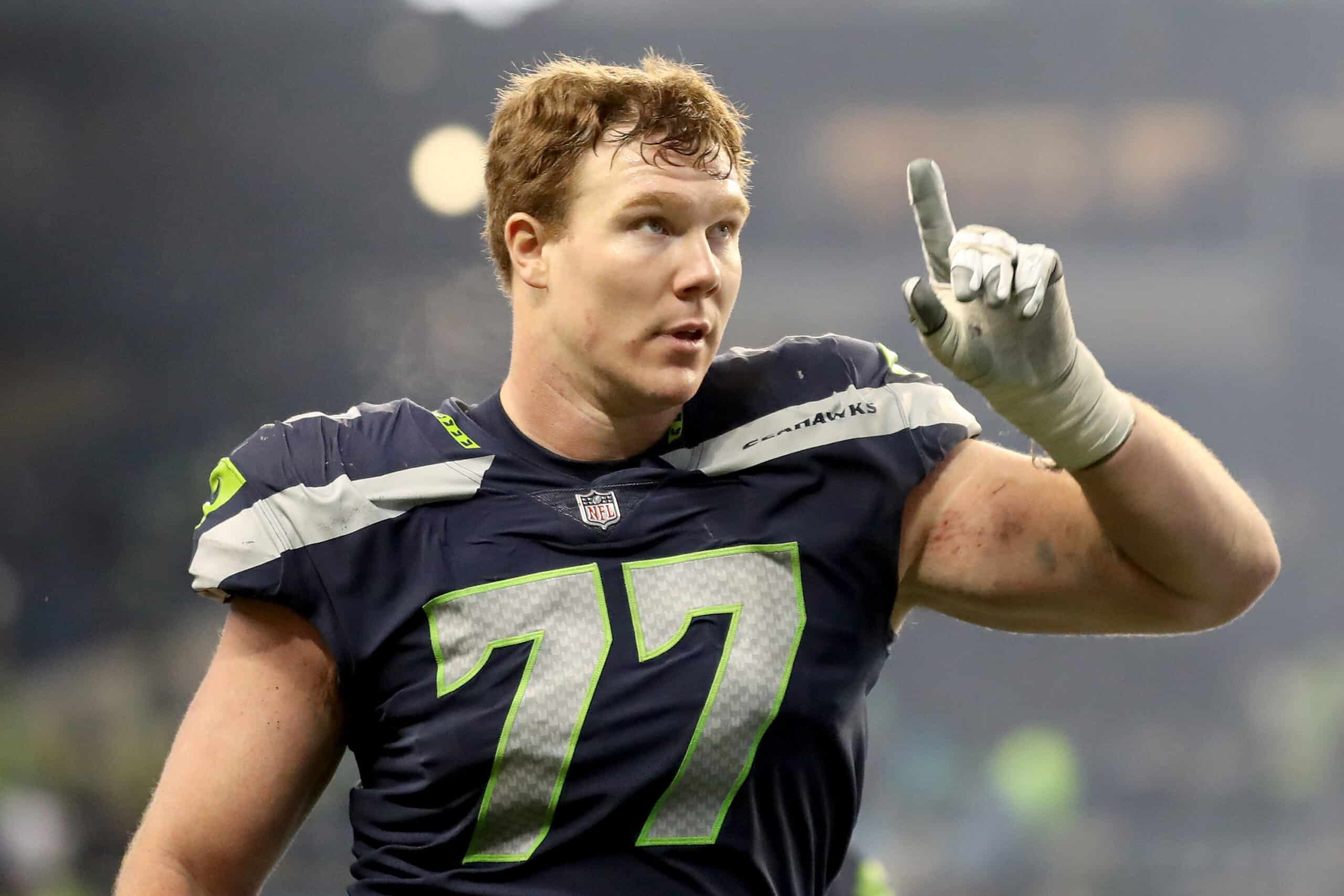 Ethan Pocic #77 of the Seattle Seahawks reacts after defeating the Detroit Lions 51-29 at Lumen Field on January 02, 2022 in Seattle, Washington. 