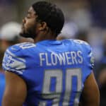 Trey Flowers #90 of the Detroit Lions watches the action during the fourth quarter of the game against the Indianapolis Colts at Ford Field on August 27, 2021 in Detroit, Michigan. The Colts defeated the Lions 27-17.