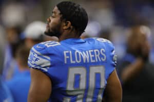 Trey Flowers #90 of the Detroit Lions watches the action during the fourth quarter of the game against the Indianapolis Colts at Ford Field on August 27, 2021 in Detroit, Michigan. The Colts defeated the Lions 27-17.