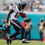 Brandin Cooks #13 of the Houston Texans scores a touchdown during the first quarter against the Jacksonville Jaguars at TIAA Bank Field on December 19, 2021 in Jacksonville, Florida. (Photo by Douglas P.