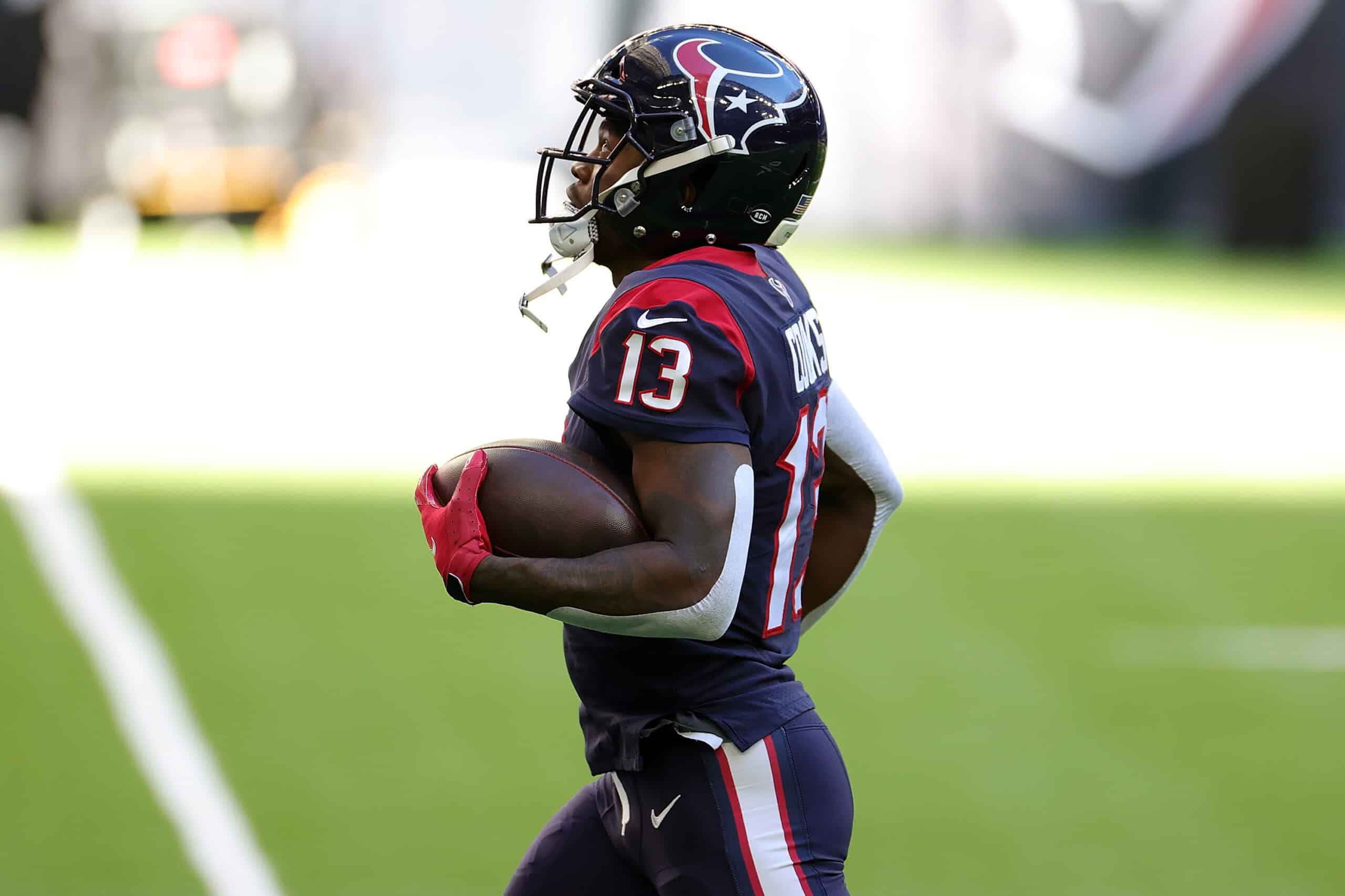 Brandin Cooks #13 of the Houston Texans participates in warmups prior to a game against the Tennessee Titans at NRG Stadium on January 03, 2021 in Houston, Texas. 