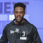 David Bell #WO03 of the Purdue Boilermakers speaks to reporters during the NFL Draft Combine at the Indiana Convention Center on March 2, 2022 in Indianapolis, Indiana.