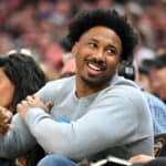 Cleveland Browns defensive end Myles Garrett talks to a fan during the second quarter of the game between the Cleveland Cavaliers and the Los Angeles Lakers at Rocket Mortgage Fieldhouse on March 21, 2022 in Cleveland, Ohio. NOTE TO USER: User expressly acknowledges and agrees that, by downloading and/or using this photograph, user is consenting to the terms and conditions of the Getty Images License Agreement.