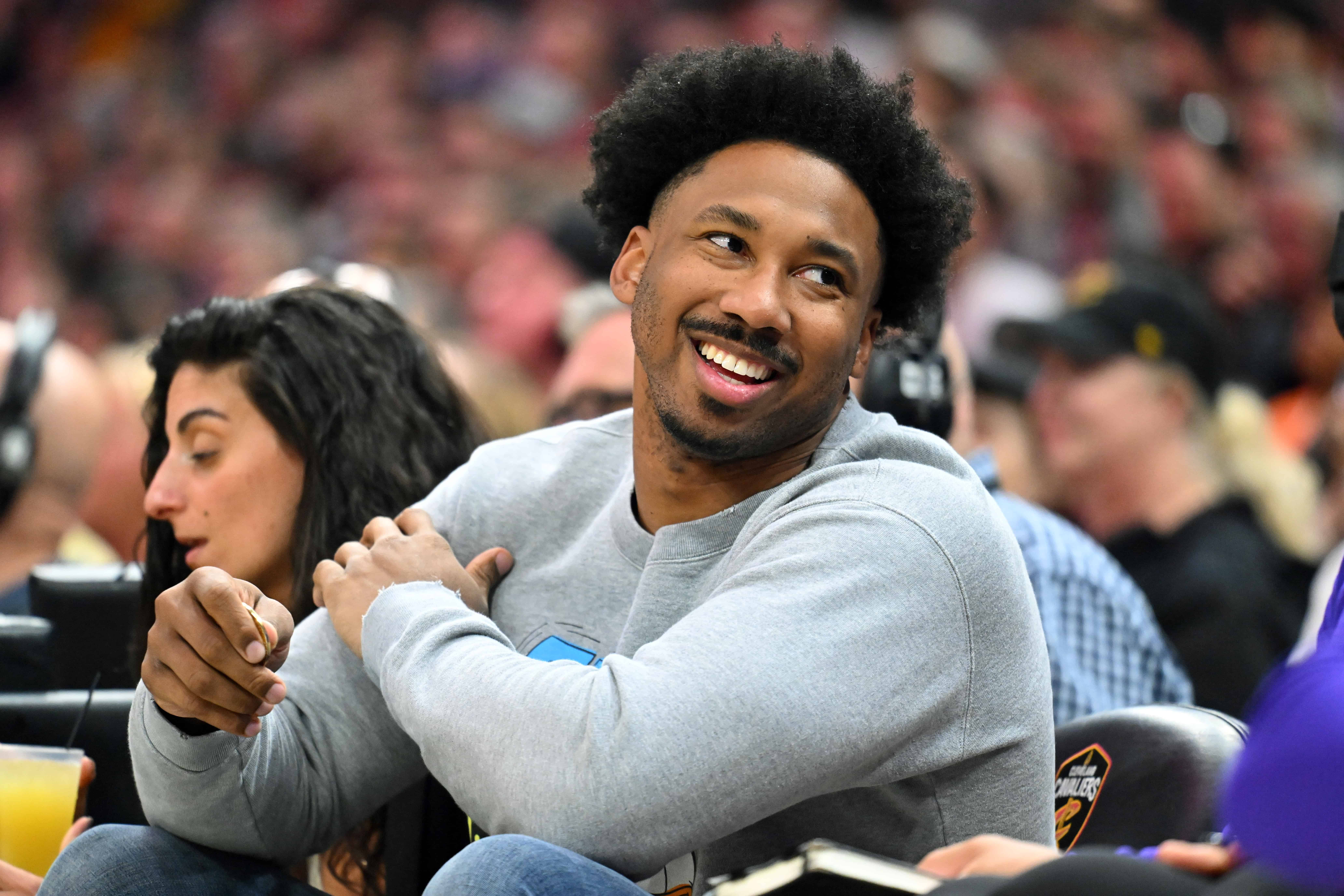 Cleveland Browns defensive end Myles Garrett talks to a fan during the second quarter of the game between the Cleveland Cavaliers and the Los Angeles Lakers at Rocket Mortgage Fieldhouse on March 21, 2022 in Cleveland, Ohio. NOTE TO USER: User expressly acknowledges and agrees that, by downloading and/or using this photograph, user is consenting to the terms and conditions of the Getty Images License Agreement. 