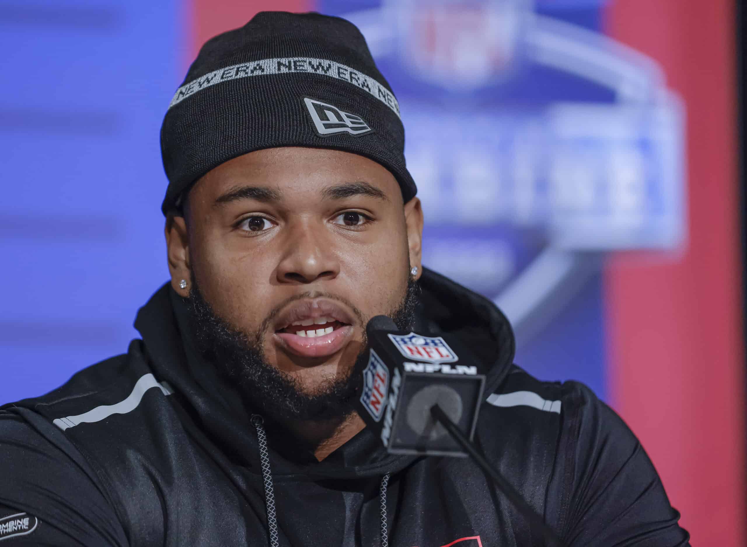 Travis Jones #DL14 of the Connecticut Huskies speaks to reporters during the NFL Draft Combine at the Indiana Convention Center on March 4, 2022 in Indianapolis, Indiana.