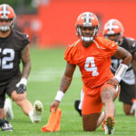 Deshaun Watson #4 of the Cleveland Browns stretches during the Cleveland Browns mandatory minicamp at CrossCountry Mortgage Campus on June 14, 2022 in Berea, Ohio.