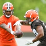 BEREA, OH - MAY 25: Deshaun Watson #4 of the Cleveland Browns runs a drill with Nick Chubb #24 during the Cleveland Browns OTAs at CrossCountry Mortgage Campus on May 25, 2022 in Berea, Ohio.