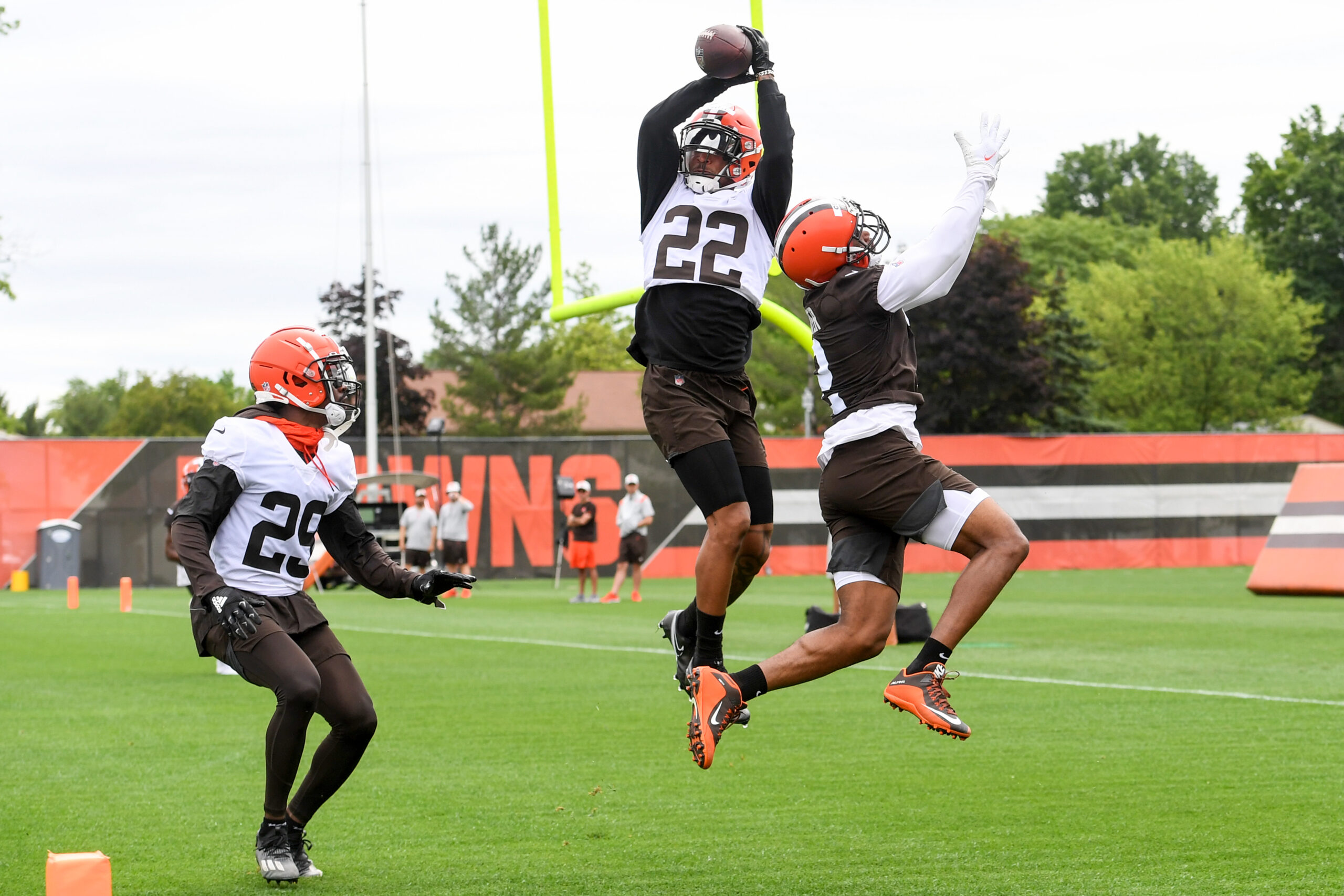 Grant Delpit #22 of the Cleveland Browns intercepts a pass intended for Amari Cooper #2 during the Cleveland Browns mandatory minicamp at CrossCountry Mortgage Campus on June 14, 2022 in Berea, Ohio.