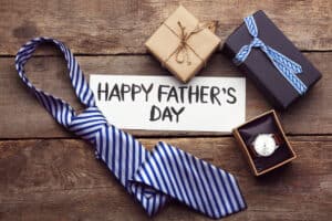 Happy Father's Day inscription with tie and watch