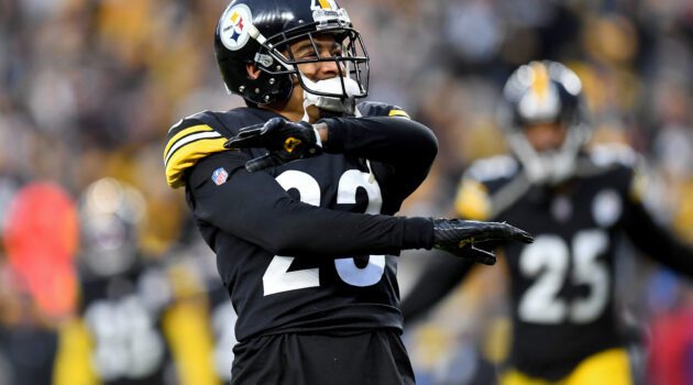 Joe Haden #23 of the Pittsburgh Steelers celebrates a stop on fourth down in the fourth quarter to end the game at Heinz Field on December 19, 2021 in Pittsburgh, Pennsylvania.