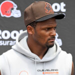 Deshaun Watson #4 of the Cleveland Browns listens to questions during press conference after the Cleveland Browns mandatory minicamp at CrossCountry Mortgage Campus on June 14, 2022 in Berea, Ohio.