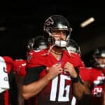 Josh Rosen #16 of the Atlanta Falcons prepares to walk onto the field during the NFL London 2021 match between New York Jets and Atlanta Falcons at Tottenham Hotspur Stadium on October 10, 2021 in London, England.