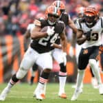 Nick Chubb #24 of the Cleveland Browns runs the ball during the third quarter against the Cincinnati Bengals at FirstEnergy Stadium on January 09, 2022 in Cleveland, Ohio.