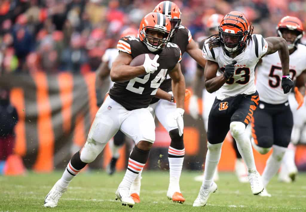 Nick Chubb #24 of the Cleveland Browns runs the ball during the third quarter against the Cincinnati Bengals at FirstEnergy Stadium on January 09, 2022 in Cleveland, Ohio.