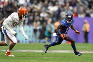 Jakeem Grant #17 of the Chicago Bears and NFC runs with the ball as Myles Garrett #95 of the Cleveland Browns and AFC defends in the third quarter of the 2022 NFL Pro Bowl at Allegiant Stadium on February 06, 2022 in Las Vegas, Nevada.