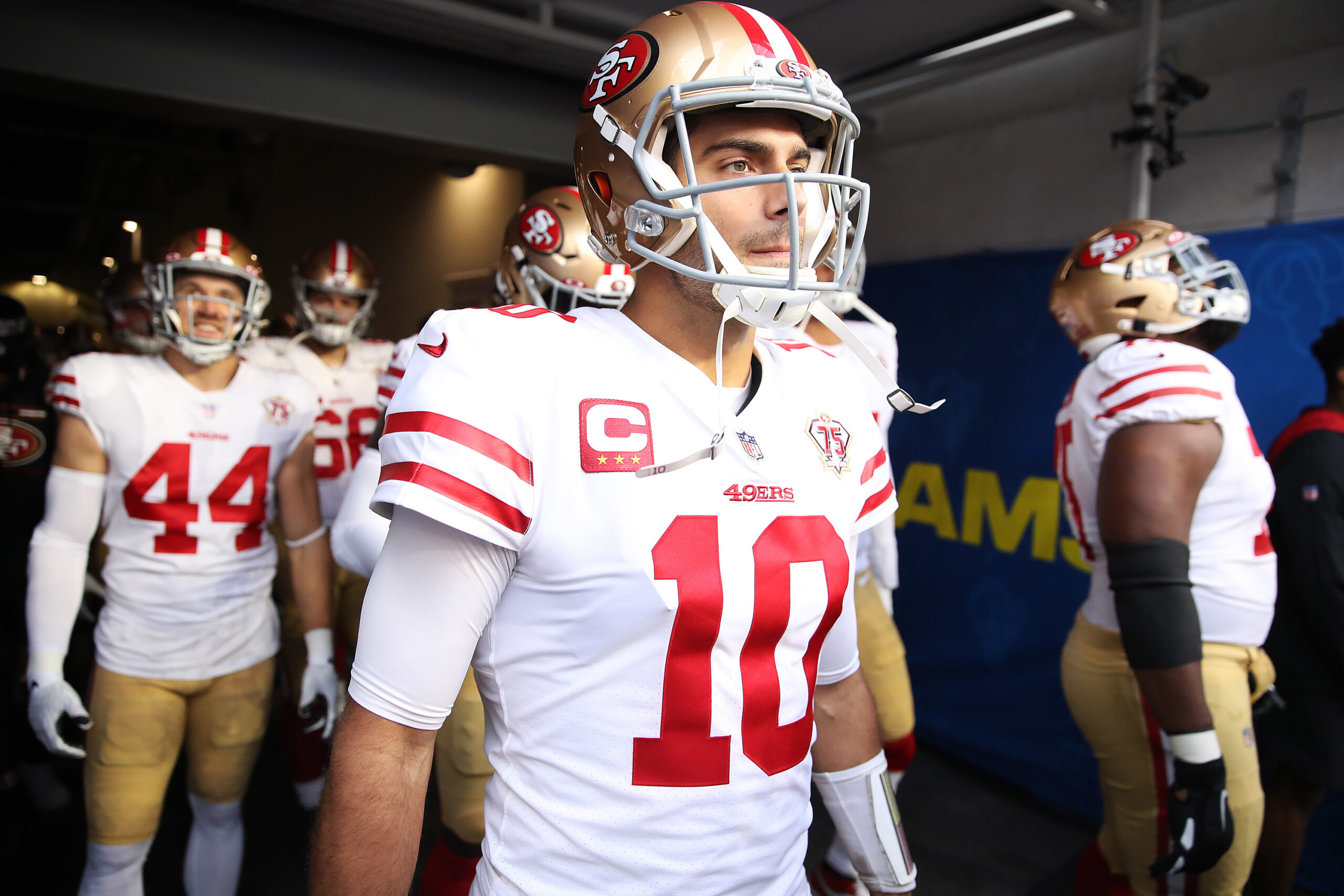 Jimmy Garoppolo #10 of the San Francisco 49ers prepares to take the field with teammates before the NFC Championship Game against the Los Angeles Rams at SoFi Stadium on January 30, 2022 in Inglewood, California.