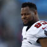 Ndamukong Suh #93 of the Tampa Bay Buccaneers looks on during the second half of the game against the Carolina Panthers at Bank of America Stadium on December 26, 2021 in Charlotte, North Carolina.