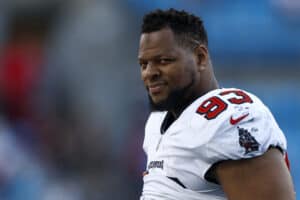 Ndamukong Suh #93 of the Tampa Bay Buccaneers looks on during the second half of the game against the Carolina Panthers at Bank of America Stadium on December 26, 2021 in Charlotte, North Carolina.