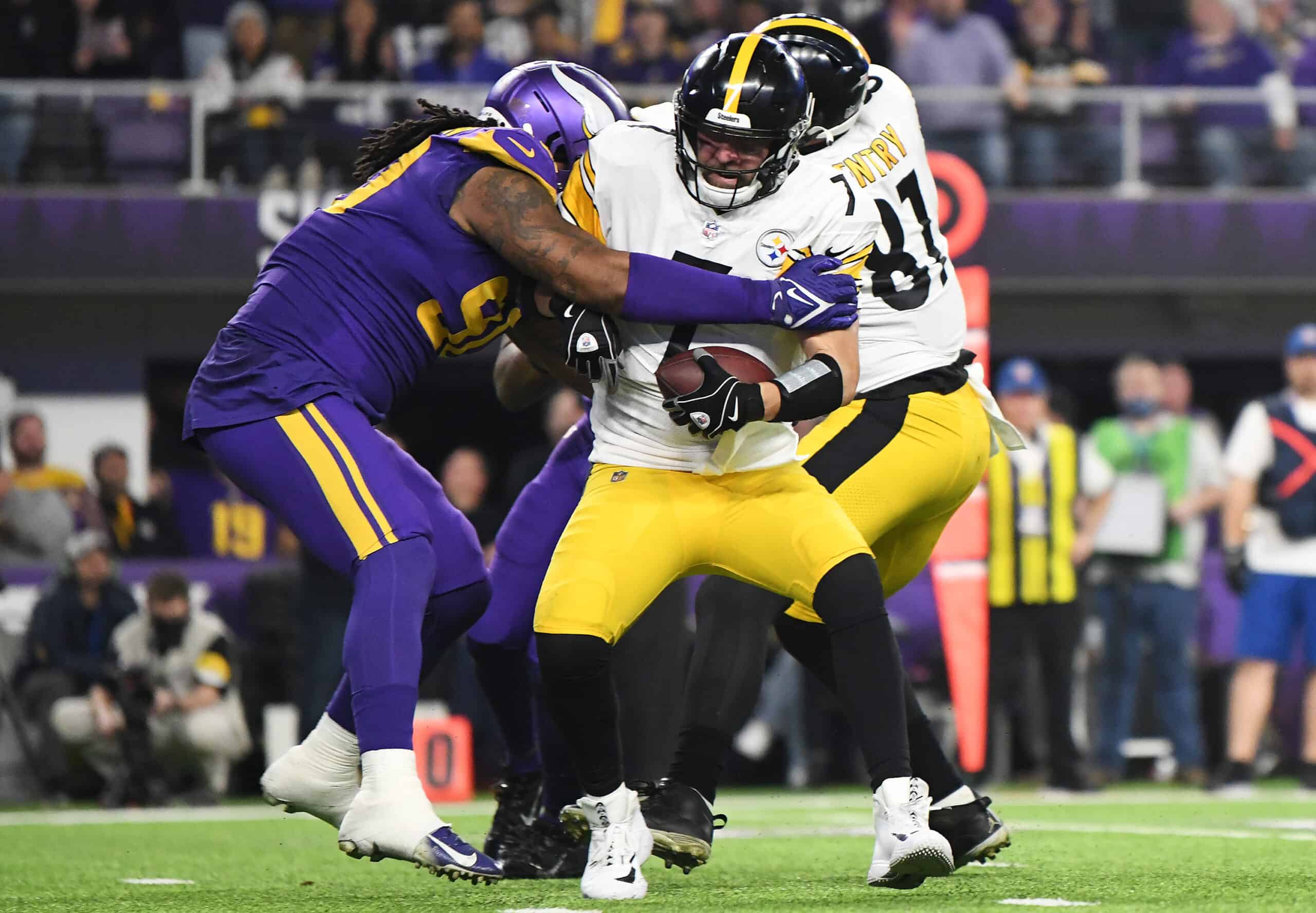 Ben Roethlisberger #7 of the Pittsburgh Steelers is sacked by Sheldon Richardson #90 of the Minnesota Vikings during the third quarter at U.S. Bank Stadium on December 09, 2021 in Minneapolis, Minnesota.