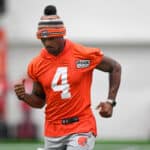 Deshaun Watson #4 of the Cleveland Browns runs a drill during Cleveland Browns training camp at CrossCountry Mortgage Campus on July 27, 2022 in Berea, Ohio.