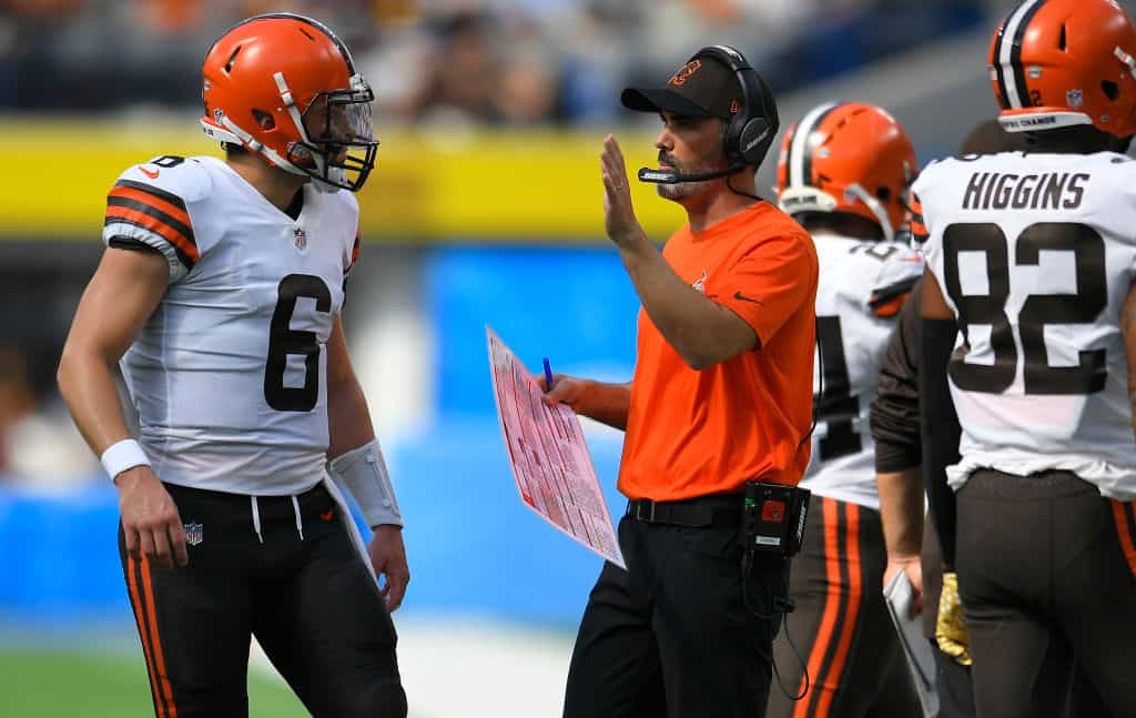 Baker Mayfield #6 of the Cleveland Browns talks with head coach Kevin Stefanski during the first half against the Los Angeles Chargers at SoFi Stadium on October 10, 2021 in Inglewood, California.