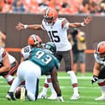 Quarterback Joshua Dobbs #15 of the Cleveland Browns yells before a play during the first quarter of a preseason game against the Philadelphia Eagles at FirstEnergy Stadium on August 21, 2022 in Cleveland, Ohio.