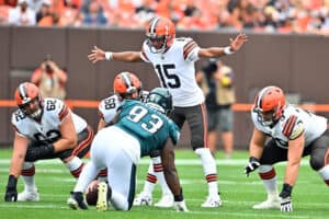 Quarterback Joshua Dobbs #15 of the Cleveland Browns yells before a play during the first quarter of a preseason game against the Philadelphia Eagles at FirstEnergy Stadium on August 21, 2022 in Cleveland, Ohio.