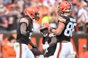 Amari Cooper #2 of the Cleveland Browns (L) is congratulated by Harrison Bryant #88 (R) after scoring a touchdown against the New York Jets during the first half at AT&T Stadium on September 18, 2022 in Arlington, Texas.