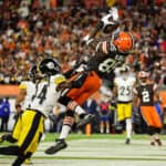 David Njoku #85 of the Cleveland Browns makes a reception for a touchdown during the second quarter ahead of Terrell Edmunds #34 of the Pittsburgh Steelers at FirstEnergy Stadium on September 22, 2022 in Cleveland, Ohio.