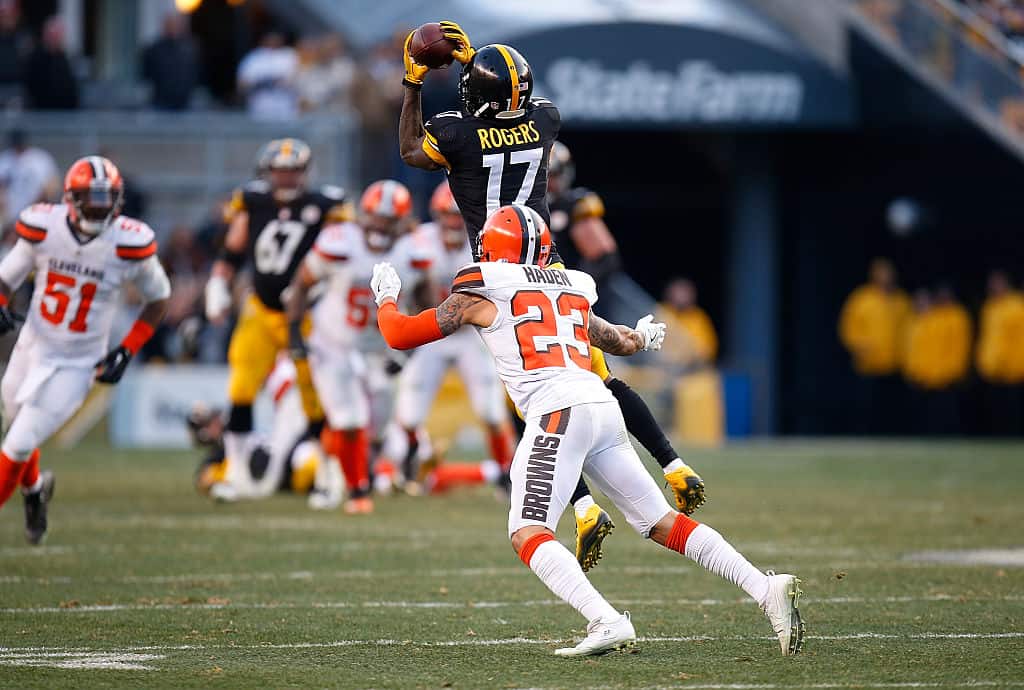 Eli Rogers #17 of the Pittsburgh Steelers makes a catch in front of Joe Haden #23 of the Cleveland Browns in the overtime period during the game at Heinz Field on January 1, 2017 in Pittsburgh, Pennsylvania.