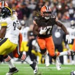 Kareem Hunt #27 of the Cleveland Browns rushes during the fourth quarter against the Pittsburgh Steelers at FirstEnergy Stadium on September 22, 2022 in Cleveland, Ohio.