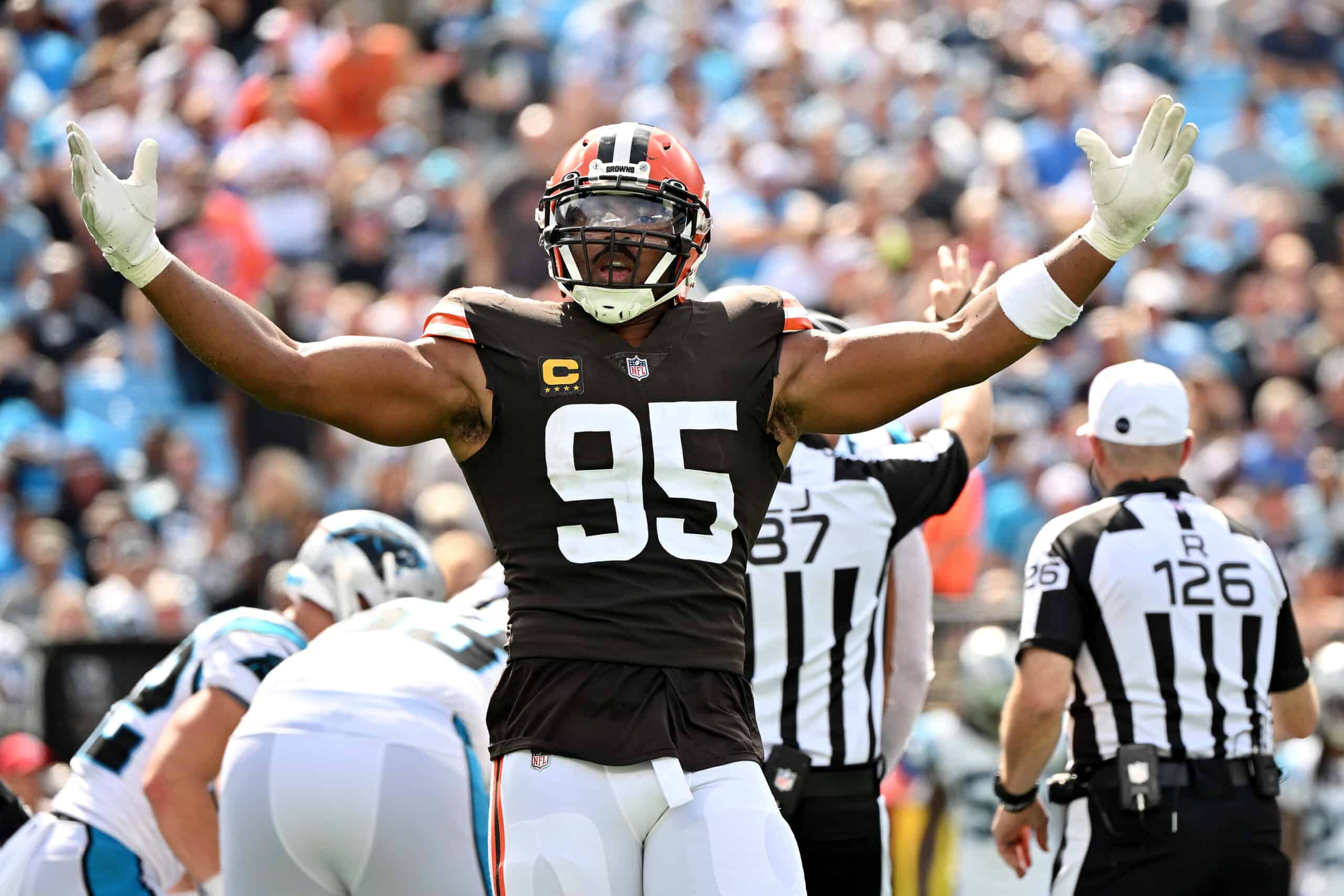 Myles Garrett #95 of the Cleveland Browns reacts after sacking Baker Mayfield #6 of the Carolina Panthers during the third quarter at Bank of America Stadium on September 11, 2022 in Charlotte, North Carolina.