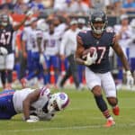 Thomas Graham Jr. #27 of the Chicago Bears fights off Tariq Thompson #41 of the Buffalo Bills during a preseason game at Soldier Field on August 21, 2021 in Chicago, Illinois. The Bills defeated the Bears 41-15.