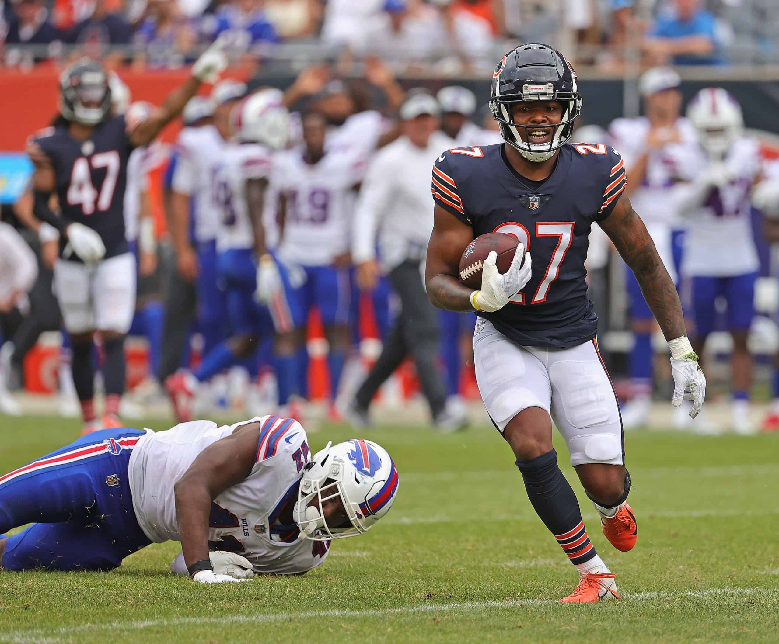 Thomas Graham Jr. #27 of the Chicago Bears fights off Tariq Thompson #41 of the Buffalo Bills during a preseason game at Soldier Field on August 21, 2021 in Chicago, Illinois. The Bills defeated the Bears 41-15. 