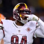 Daron Payne #94 of the Washington Commanders celebrates a sack during the first quarter against the Chicago Bears at Soldier Field on October 13, 2022 in Chicago, Illinois.