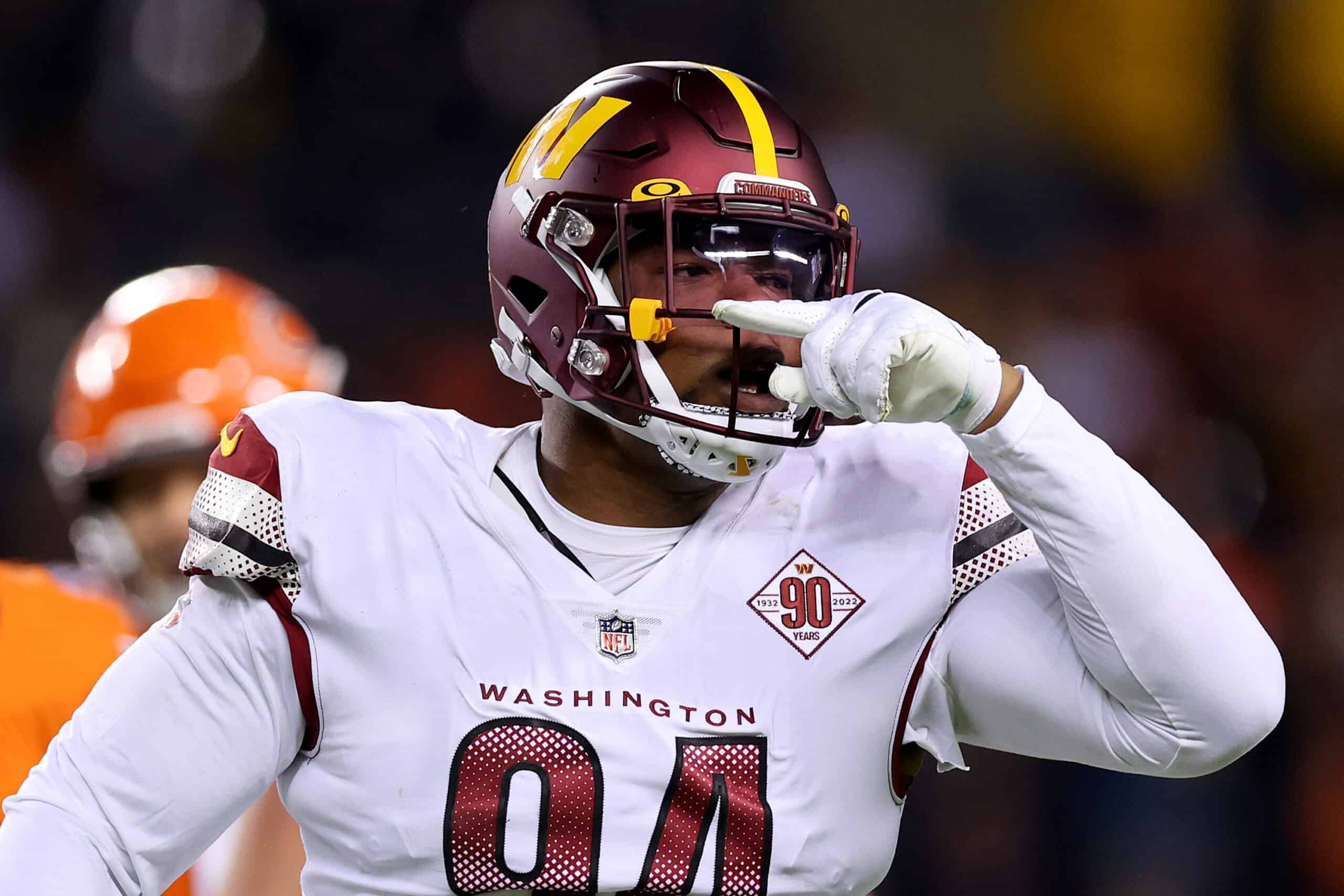 Daron Payne #94 of the Washington Commanders celebrates a sack during the first quarter against the Chicago Bears at Soldier Field on October 13, 2022 in Chicago, Illinois. 