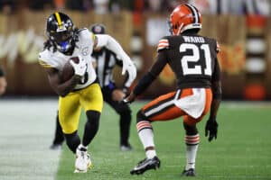 Diontae Johnson #18 of the Pittsburgh Steelers makes a reception ahead of Denzel Ward #21 of the Cleveland Browns during the third quarter at FirstEnergy Stadium on September 22, 2022 in Cleveland, Ohio