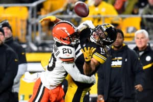 Greg Newsome II #20 of the Cleveland Browns breaks up a pass meant for Chase Claypool #11 of the Pittsburgh Steelers in the fourth quarter at Heinz Field on January 03, 2022 in Pittsburgh, Pennsylvania.