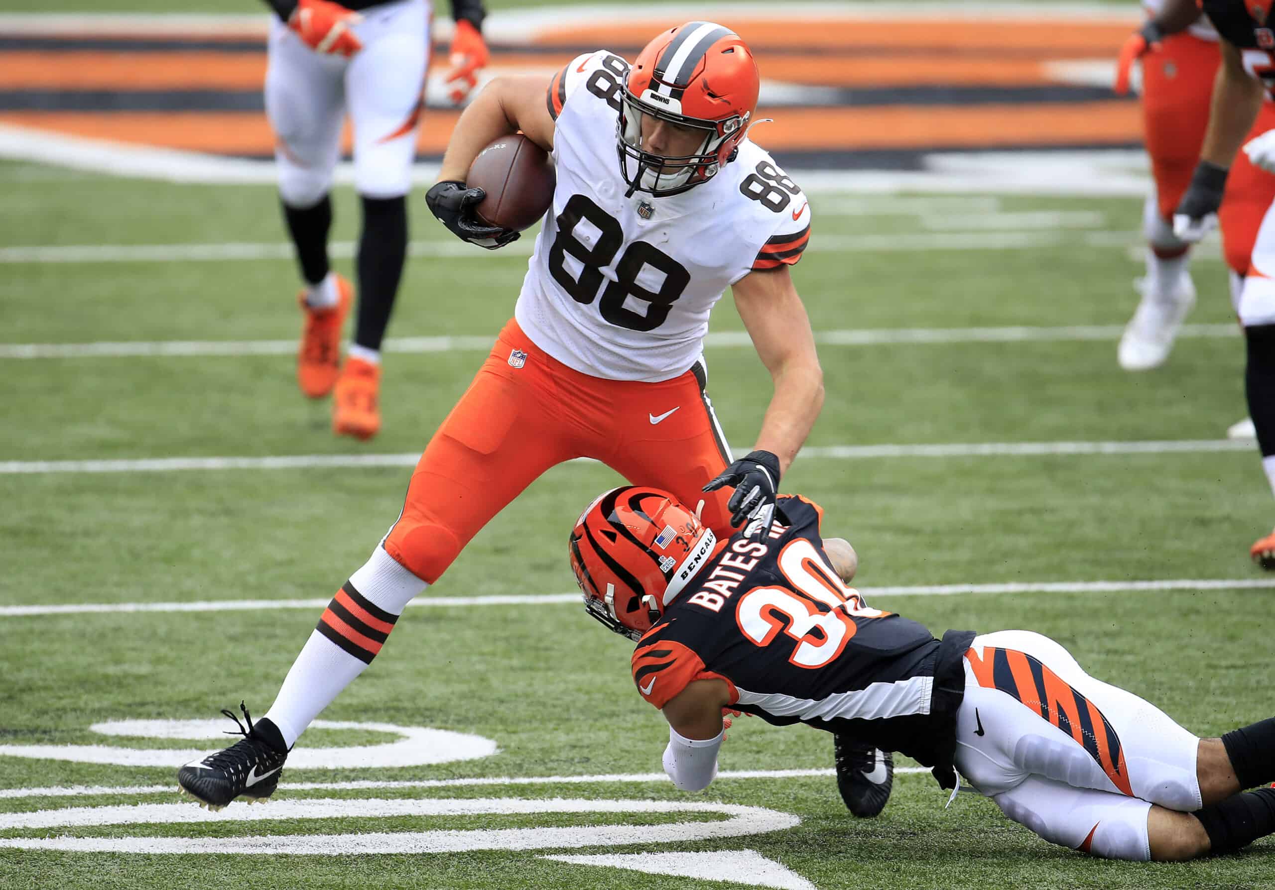 Harrison Bryant #88 of the Cleveland Browns is tackled by Jessie Bates III #30 of the Cincinnati Bengals during the second half at Paul Brown Stadium on October 25, 2020 in Cincinnati, Ohio.