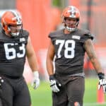 Evan Brown #63 and Jack Conklin #78 of the Cleveland Browns work out during training camp on August 16, 2020 at the Cleveland Browns training facility in Berea, Ohio.