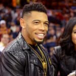 Joe Haden of the Cleveland Browns looks on from the crowd during a game between the Cleveland Cavaliers and the New York Knicks at Quicken Loans Arena on October 30, 2014 in Cleveland, Ohio. NOTE TO USER: User expressly acknowledges and agrees that, by downloading and or using this photograph, User is consenting to the terms and conditions of the Getty Images License Agreement.