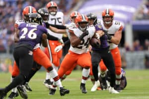 Nick Chubb #24 of the Cleveland Browns runs the ball during the second half of the game against the Baltimore Ravens at M&T Bank Stadium on October 23, 2022 in Baltimore, Maryland.