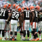 The Cleveland Browns offense huddles up during the second quarter of the game against the Miami Dolphins at Hard Rock Stadium on November 13, 2022 in Miami Gardens, Florida.