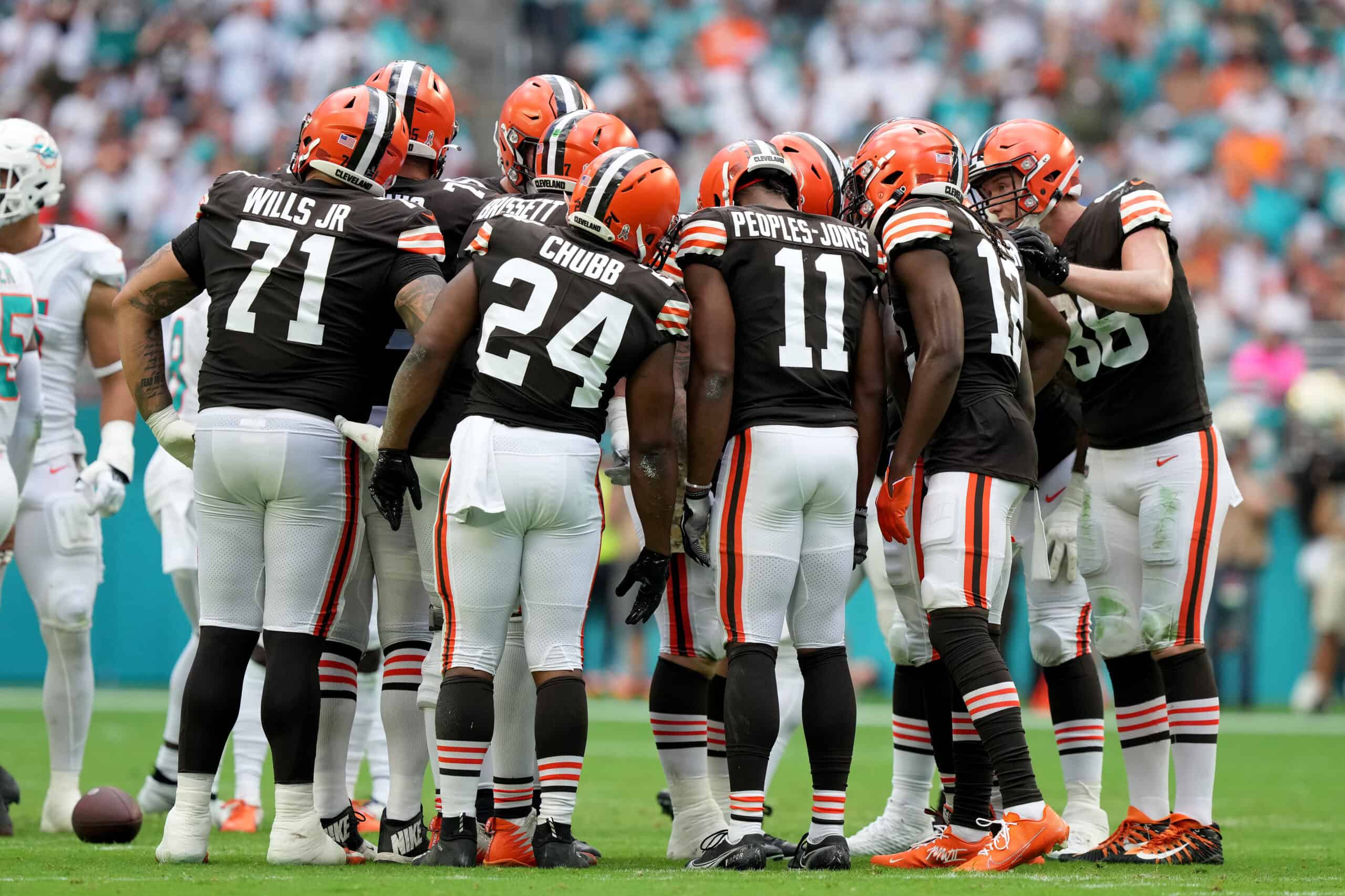 The Cleveland Browns offense huddles up during the second quarter of the game against the Miami Dolphins at Hard Rock Stadium on November 13, 2022 in Miami Gardens, Florida.