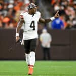 Deshaun Watson #4 of the Cleveland Browns signals to teammates during the first half of a preseason game against the Chicago Bears at FirstEnergy Stadium on August 27, 2022 in Cleveland, Ohio.