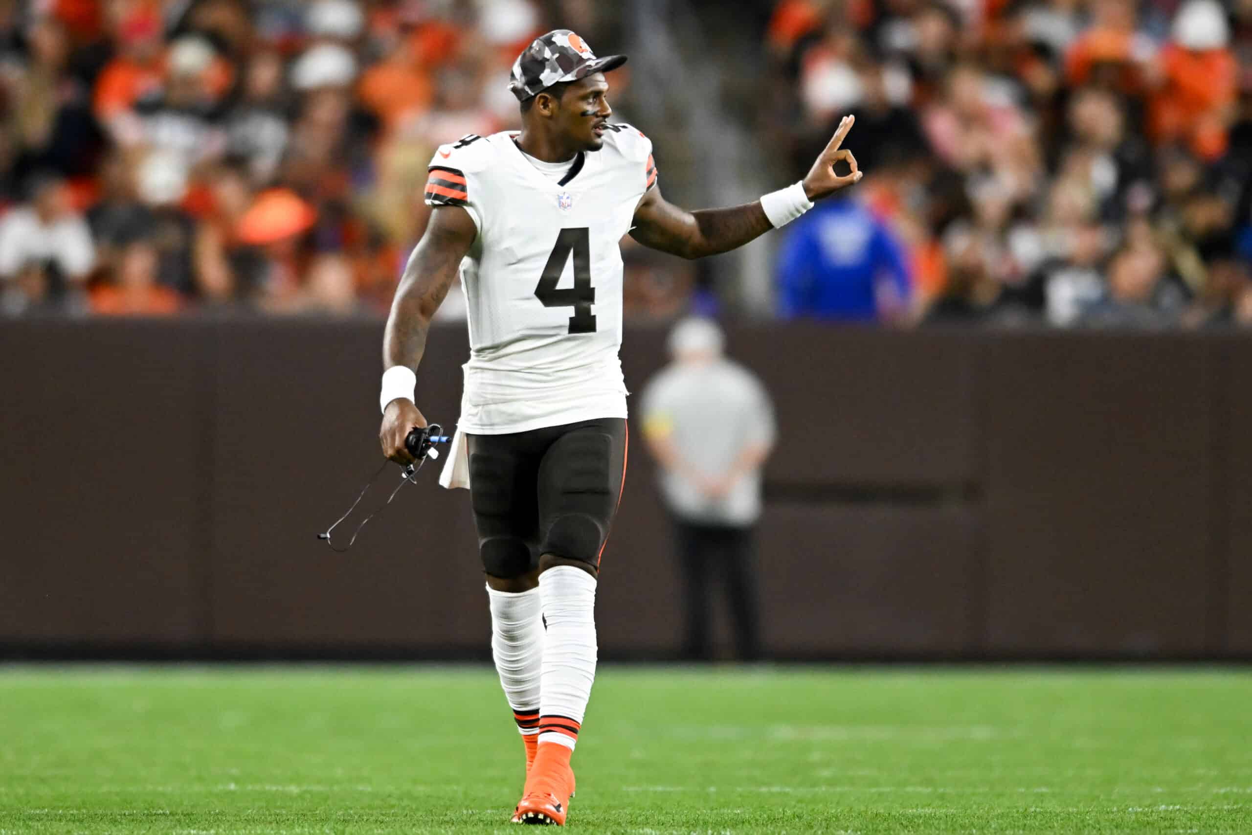 Deshaun Watson #4 of the Cleveland Browns signals to teammates during the first half of a preseason game against the Chicago Bears at FirstEnergy Stadium on August 27, 2022 in Cleveland, Ohio. 